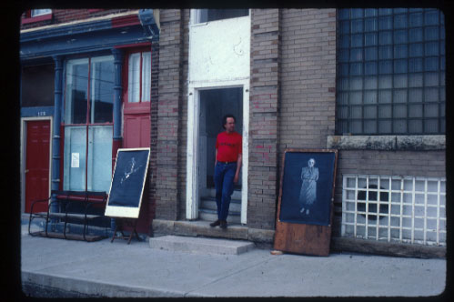 Peter Feldstein in front of his studio in Oxford Iowa